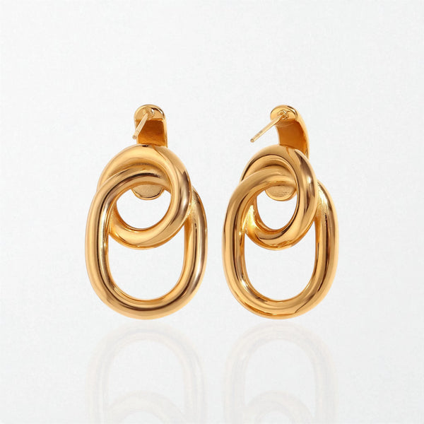 Pair of Camilla chunky interlocking link earrings in 18K gold-plated waterproof stainless steel, two oval links joined on a stud