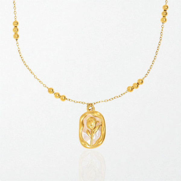Rosalie mother of pearl rose necklace in 18K gold-plated waterproof stainless steel, an oval pendant holding a rose, on a bead chain
