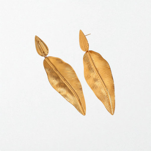 Pair of Soraya sculptural double leaf statement earrings in 18K gold-plated waterproof stainless steel, a small leaf above a long veined leaf