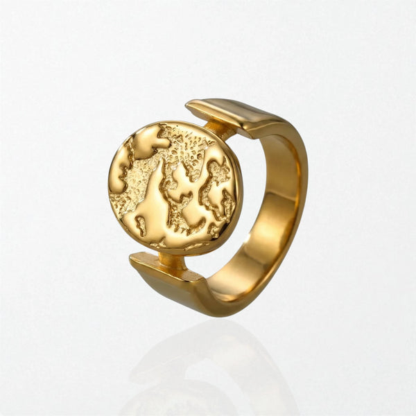 Gaia sculptural globe coin ring in 18K gold-plated waterproof stainless steel, a textured globe disc on a wide open band