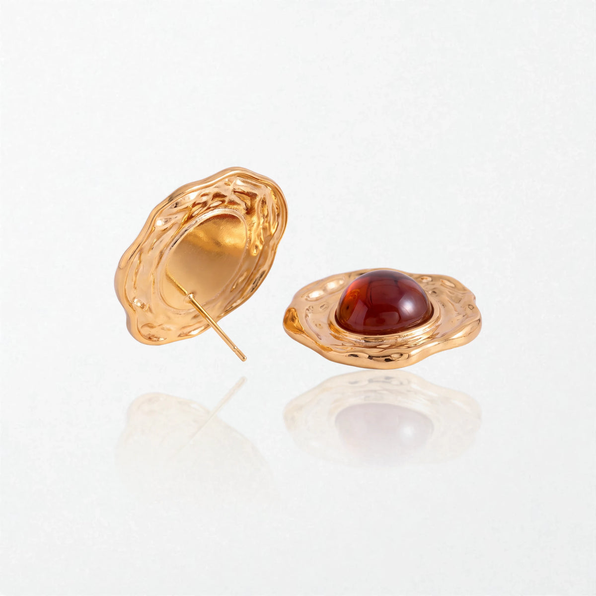 Naomi hammered amber stud earrings shown front and back, with the wavy gold backplate and post