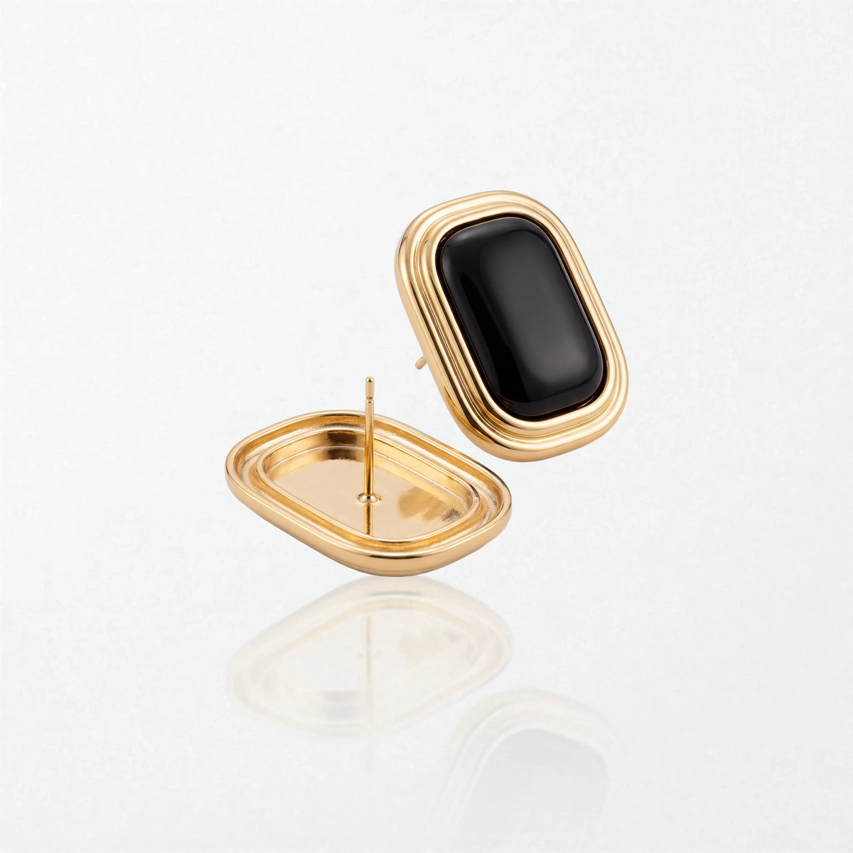Sabine black square stud earrings shown front and back, with the hollow gold back and post