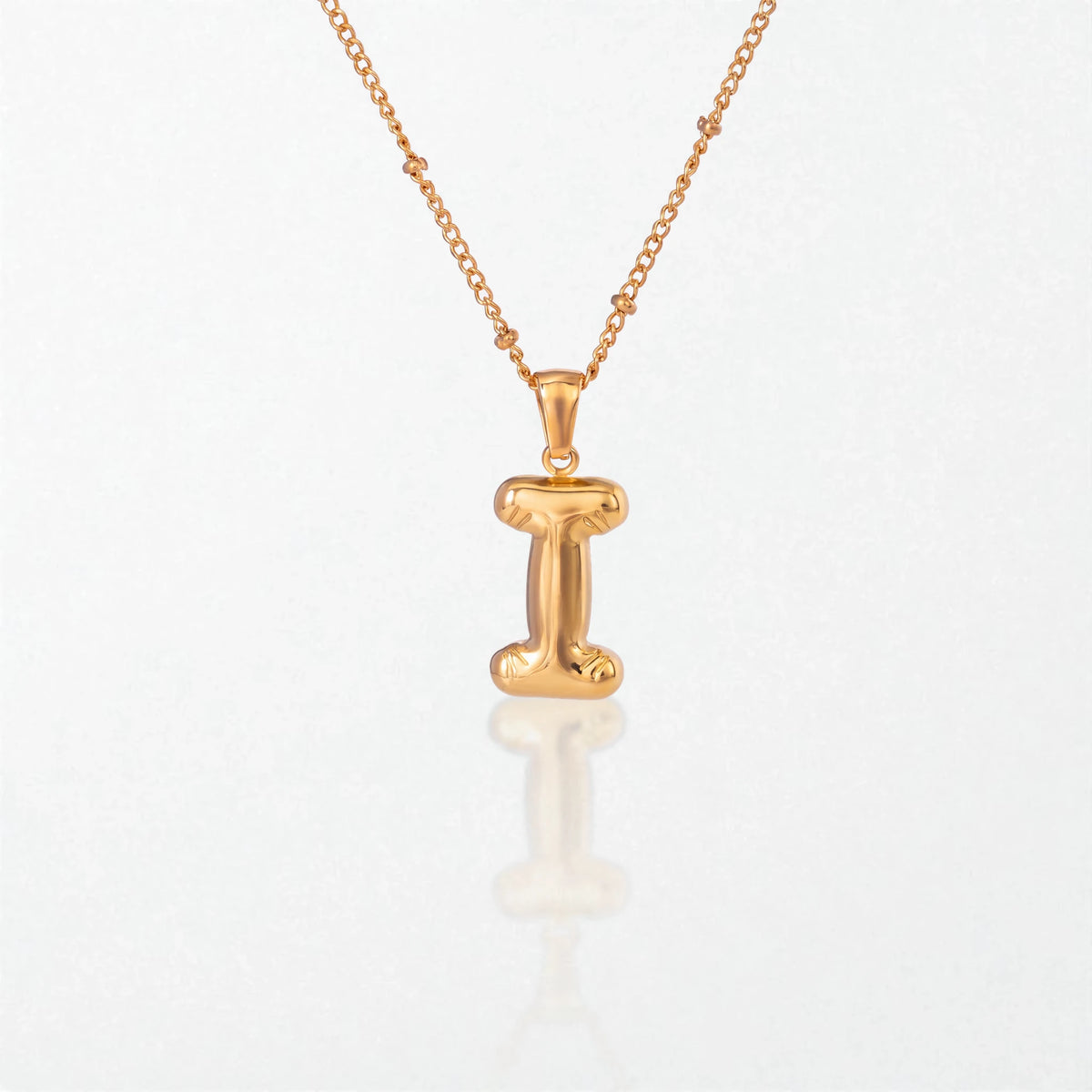 Bubble initial necklace with letter I pendant in 18K gold plated stainless steel, on a satellite chain