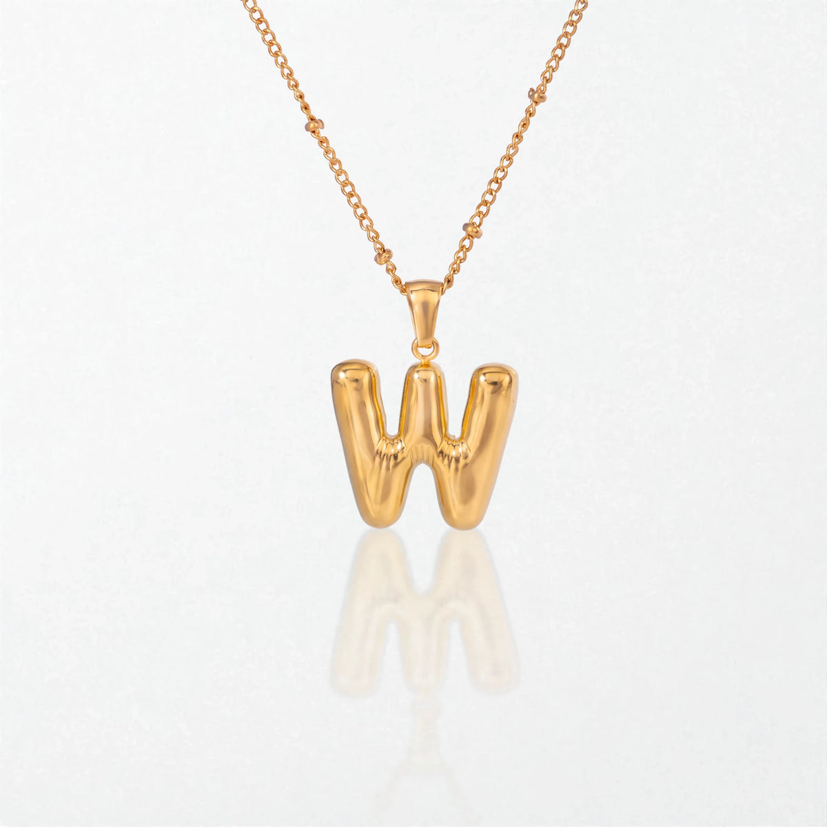 Bubble initial necklace with letter W pendant in 18K gold plated stainless steel, on a satellite chain