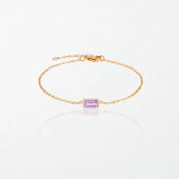 Juno birthstone bracelet in 14K gold-plated waterproof stainless steel with a small baguette lavender purple stone for June