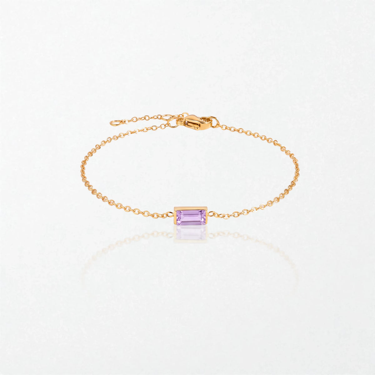 Juno birthstone bracelet in 14K gold-plated waterproof stainless steel with a small baguette lavender purple stone for June