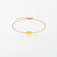 Juno birthstone bracelet in 14K gold-plated waterproof stainless steel with a small baguette citrine yellow stone for November