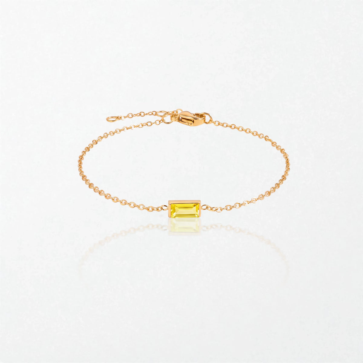 Juno birthstone bracelet in 14K gold-plated waterproof stainless steel with a small baguette citrine yellow stone for November