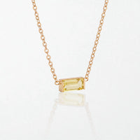 Juno birthstone necklace in 14K gold-plated waterproof stainless steel with a small baguette citrine yellow stone for November