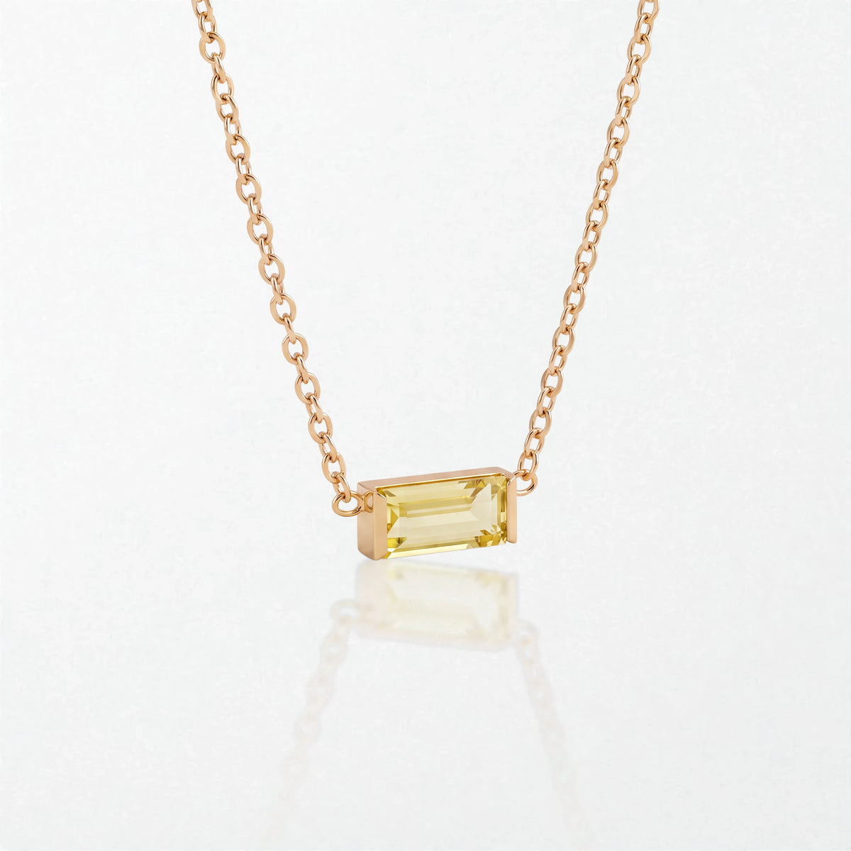 Juno birthstone necklace in 14K gold-plated waterproof stainless steel with a small baguette citrine yellow stone for November