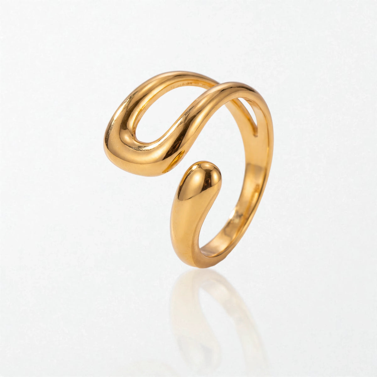 Wren molten wrap ring in 18K gold-plated waterproof stainless steel: one smooth band curling into an open U-shaped loop beside a teardrop tip