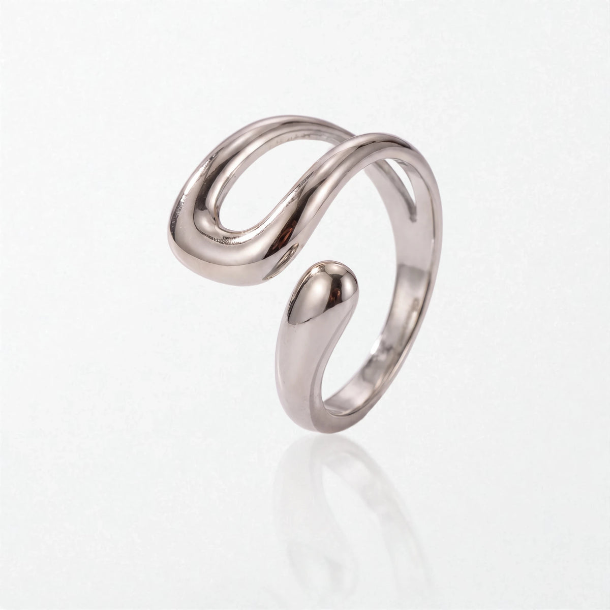 Wren molten wrap ring in polished silver stainless steel, with an open U-shaped loop beside a rounded teardrop tip