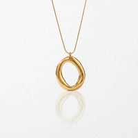 Mila molten open oval pendant necklace in 18K gold-plated waterproof stainless steel, a glossy open oval on a fine snake chain