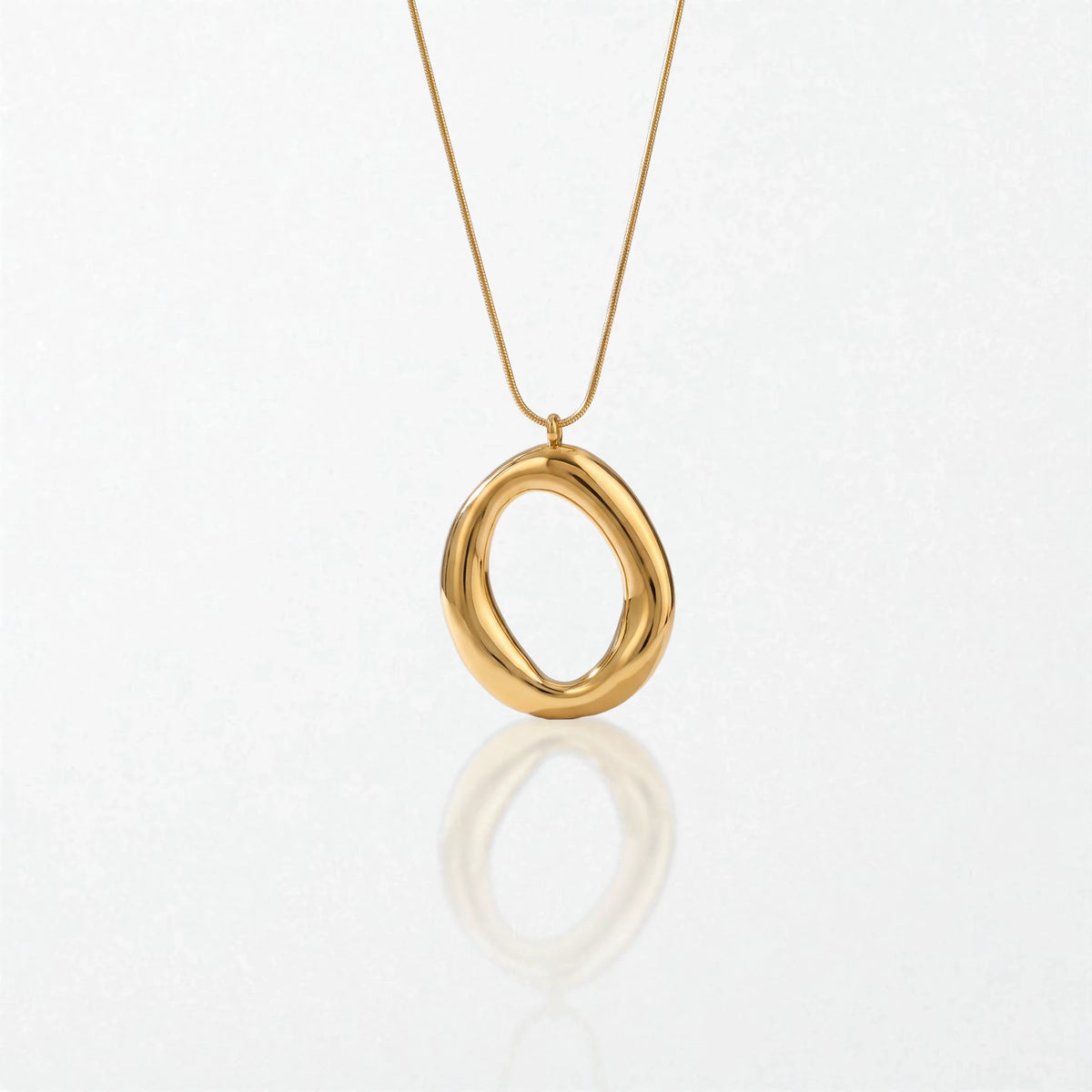 Mila molten open oval pendant necklace in 18K gold-plated waterproof stainless steel, a glossy open oval on a fine snake chain