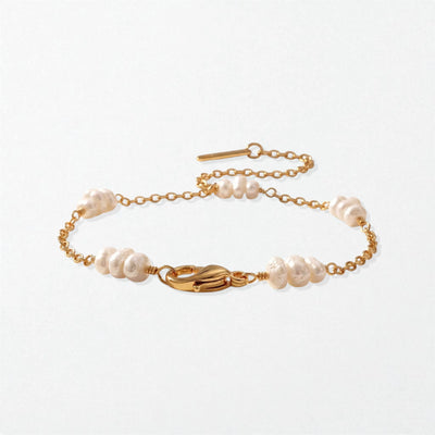 Eleanor pearl station bracelet in 18K gold-plated waterproof stainless steel, a fine chain with small freshwater pearl clusters and a lobster clasp