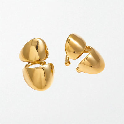 Pair of Odette sculptural split dome ear cuffs in 18K gold-plated waterproof stainless steel, glossy gold domes
